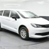 White Chrysler Voyager with BraunAbility Rear Entry Manual Fold Out conversion