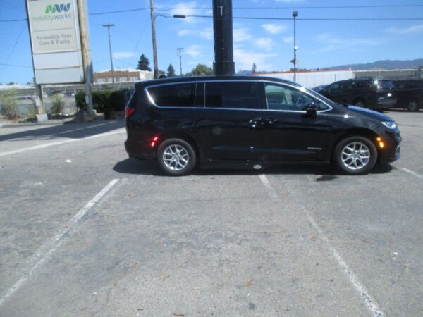 Black Chrysler Pacifica with Driverge Side Entry Automatic Fold Out conversion