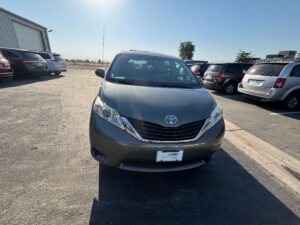 Green Toyota Sienna with BraunAbility Side Entry Automatic In Floor conversion