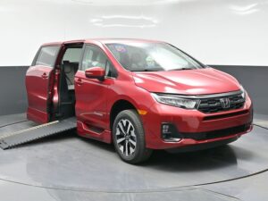 Red Honda Odyssey with BraunAbility Side Entry Automatic In Floor conversion