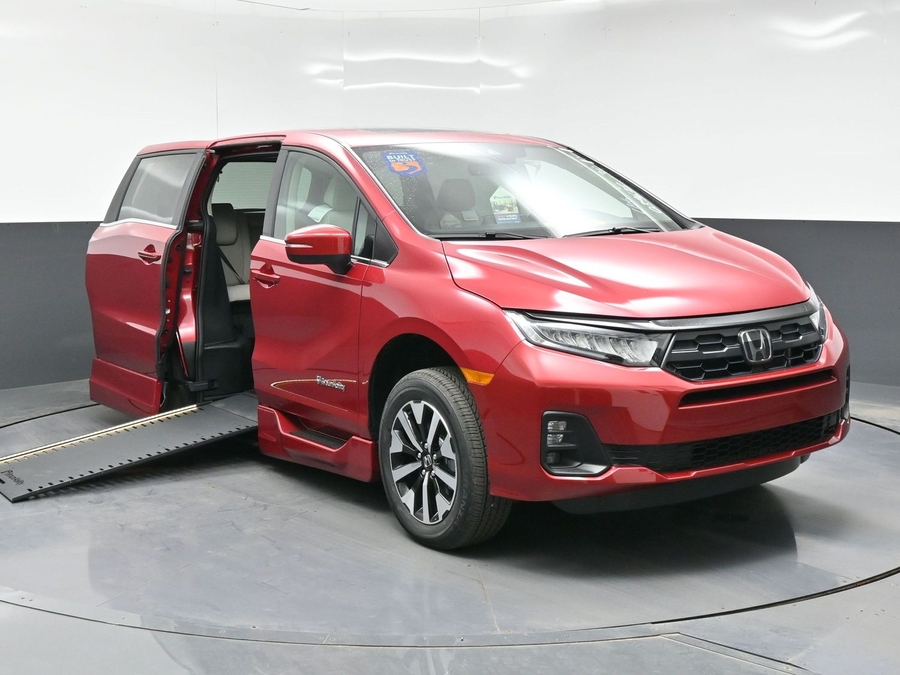 Red Honda Odyssey with BraunAbility Side Entry Automatic In Floor conversion