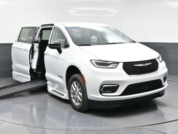 White Chrysler Pacifica with BraunAbility Side Entry Automatic Fold Out conversion