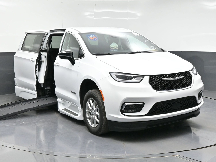 White Chrysler Pacifica with BraunAbility Side Entry Automatic Fold Out conversion