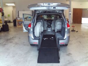 Silver Toyota Sienna with BraunAbility Rear Entry Automatic Fold Out conversion