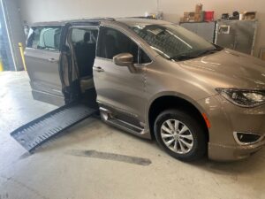 Silver Chrysler Pacifica with BraunAbility Side Entry Automatic Fold Out conversion