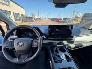 Blue Toyota Sienna with Driverge Rear Entry Manual Fold Out conversion