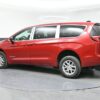 Red Chrysler Pacifica with BraunAbility Rear Entry Manual Fold Out conversion