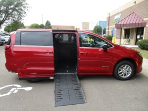 Red Chrysler Pacifica with Driverge Side Entry Automatic Fold Out conversion