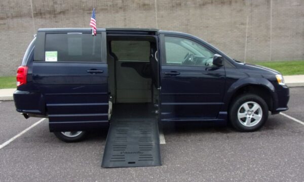 Blue Dodge Grand Caravan with BraunAbility Side Entry Manual Fold Out conversion