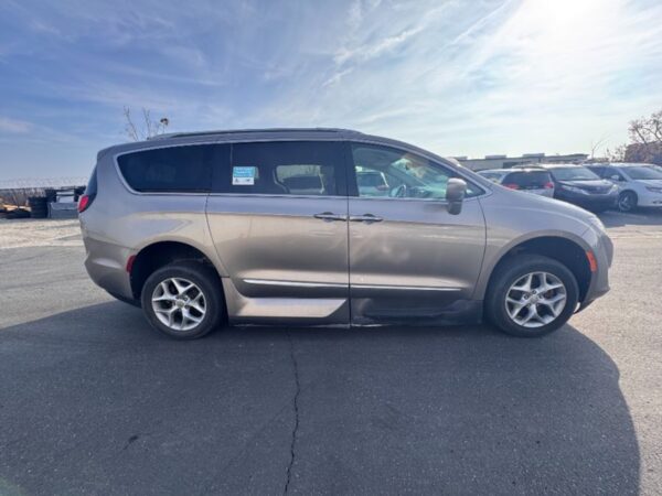 Silver Chrysler Pacifica with Vantage Mobility Side Entry Automatic In Floor conversion