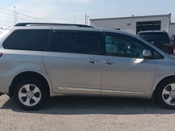 Silver Toyota Sienna with Freedom Motors Rear Entry Manual Fold Out conversion
