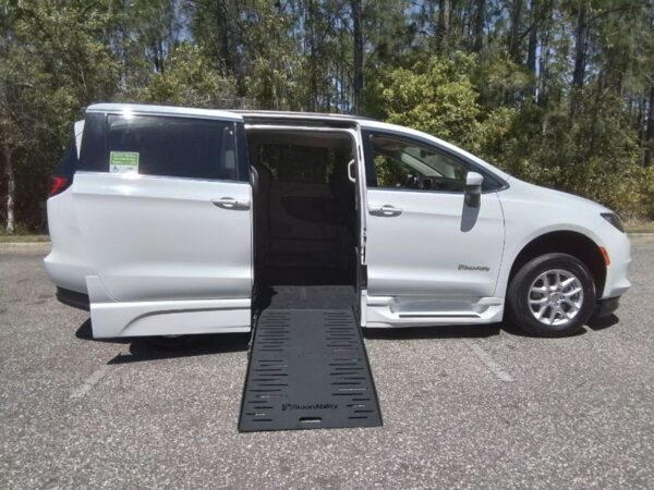 White Chrysler Voyager with BraunAbility Side Entry Automatic Fold Out conversion