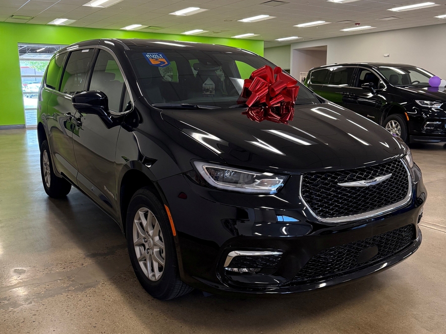 Black Chrysler Pacifica with BraunAbility Rear Entry Manual Fold Out conversion