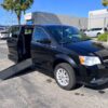 Black Dodge Grand Caravan with Adaptive Vans Side Entry Automatic Fold Out conversion