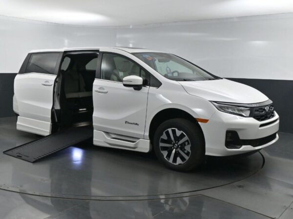 White Honda Odyssey with BraunAbility Side Entry Automatic In Floor conversion