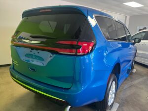 Blue Chrysler Pacifica with BraunAbility Side Entry Automatic Fold Out conversion