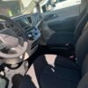 White Chrysler Voyager with Driverge Side Entry Automatic Fold Out conversion