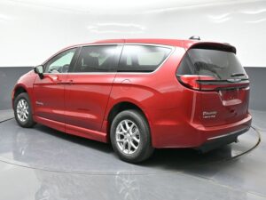 Red Chrysler Pacifica with BraunAbility Side Entry Automatic Fold Out conversion