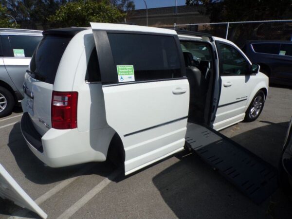 White Dodge Grand Caravan with BraunAbility Side Entry Automatic Fold Out conversion