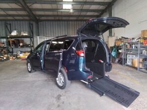 Blue Chrysler Pacifica with FR Conversions Rear Entry Manual Fold Out conversion