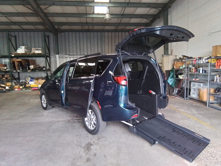 Blue Chrysler Pacifica with FR Conversions Rear Entry Manual Fold Out conversion
