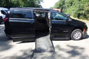 Black Chrysler Voyager with BraunAbility Side Entry Automatic Fold Out conversion
