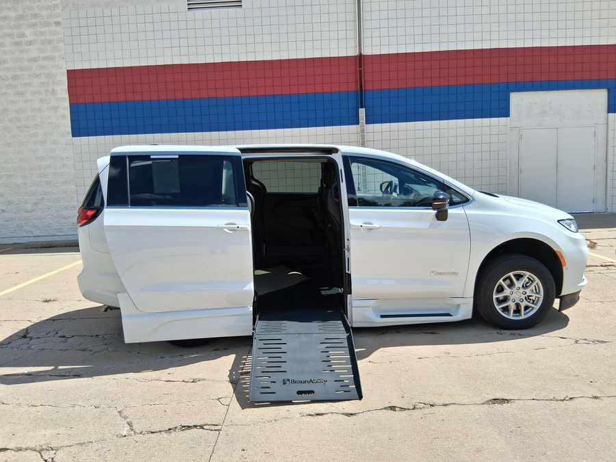 White Chrysler Pacifica with BraunAbility Side Entry Automatic Fold Out conversion