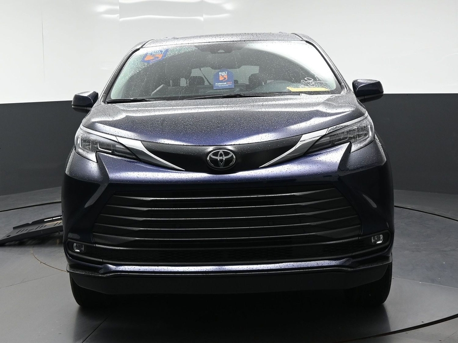 Blue Toyota Sienna with BraunAbility Side Entry Automatic Fold Out conversion