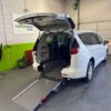 White Chrysler Voyager with Driverge Rear Entry Manual Fold Out conversion