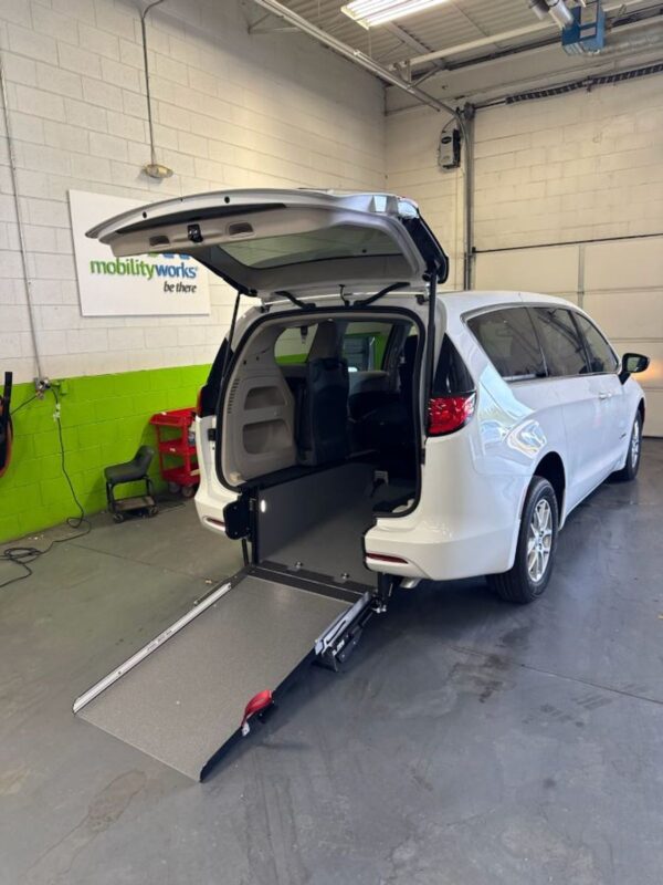 White Chrysler Voyager with Driverge Rear Entry Manual Fold Out conversion