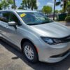 Silver Chrysler Voyager with BraunAbility Side Entry Manual Fold Out conversion