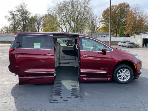 Red Chrysler Pacifica with BraunAbility Side Entry Automatic Fold Out conversion