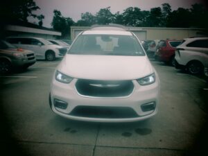 White Chrysler Pacifica with FR Conversions Rear Entry Manual Fold Out conversion