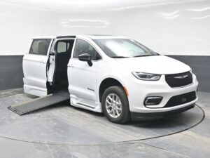 White Chrysler Pacifica with BraunAbility Side Entry Automatic In Floor conversion