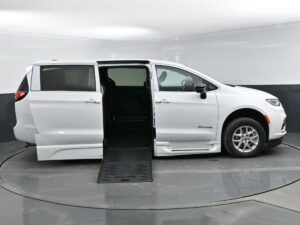 White Chrysler Pacifica with BraunAbility Side Entry Automatic Fold Out conversion