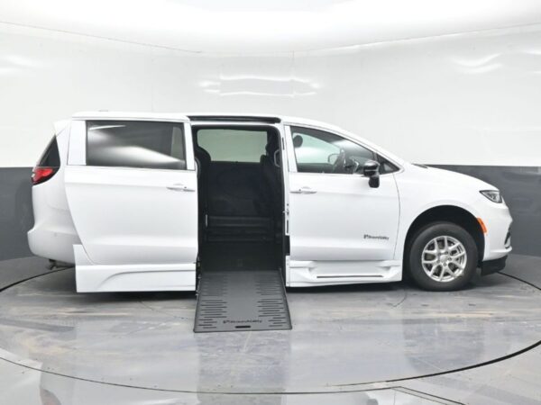 White Chrysler Pacifica with BraunAbility Side Entry Automatic Fold Out conversion