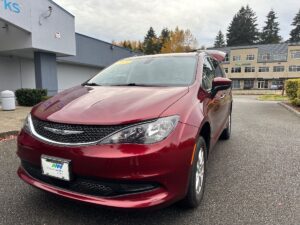 Red Chrysler Voyager with BraunAbility Rear Entry Manual Fold Out conversion