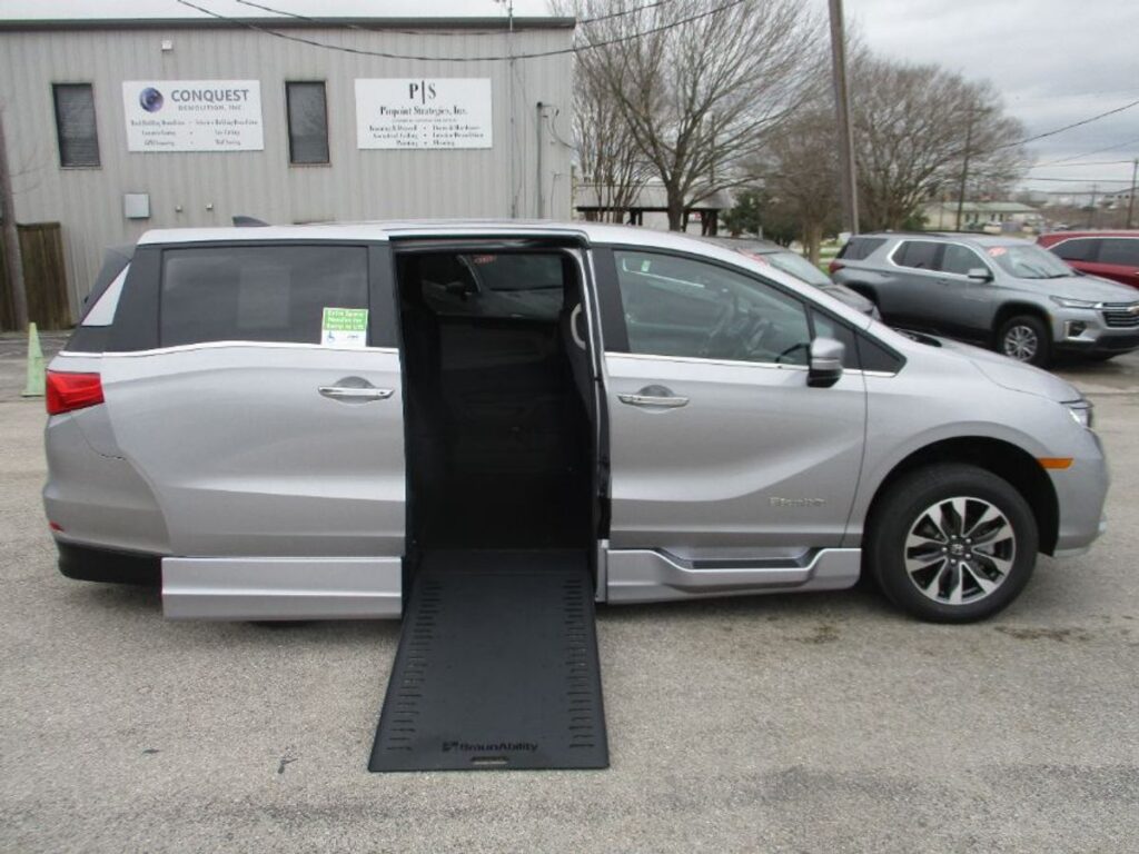 Silver Honda Odyssey with BraunAbility Side Entry Automatic In Floor conversion