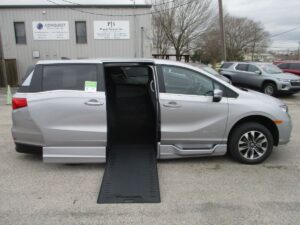 Silver Honda Odyssey with BraunAbility Side Entry Automatic In Floor conversion