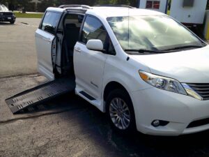 White Toyota Sienna with BraunAbility Side Entry Automatic Fold Out conversion