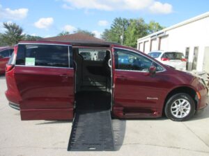 Red Chrysler Voyager with BraunAbility Side Entry Automatic Fold Out conversion