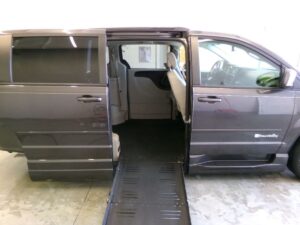Grey Dodge Grand Caravan with BraunAbility Side Entry Automatic Fold Out conversion