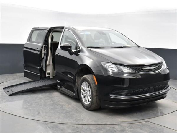Black Chrysler Voyager with BraunAbility Side Entry Automatic Fold Out conversion
