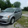 Silver Dodge Grand Caravan with BraunAbility Side Entry Manual Fold Out conversion