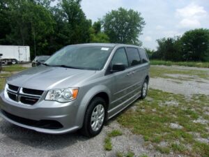 Silver Dodge Grand Caravan with BraunAbility Side Entry Manual Fold Out conversion