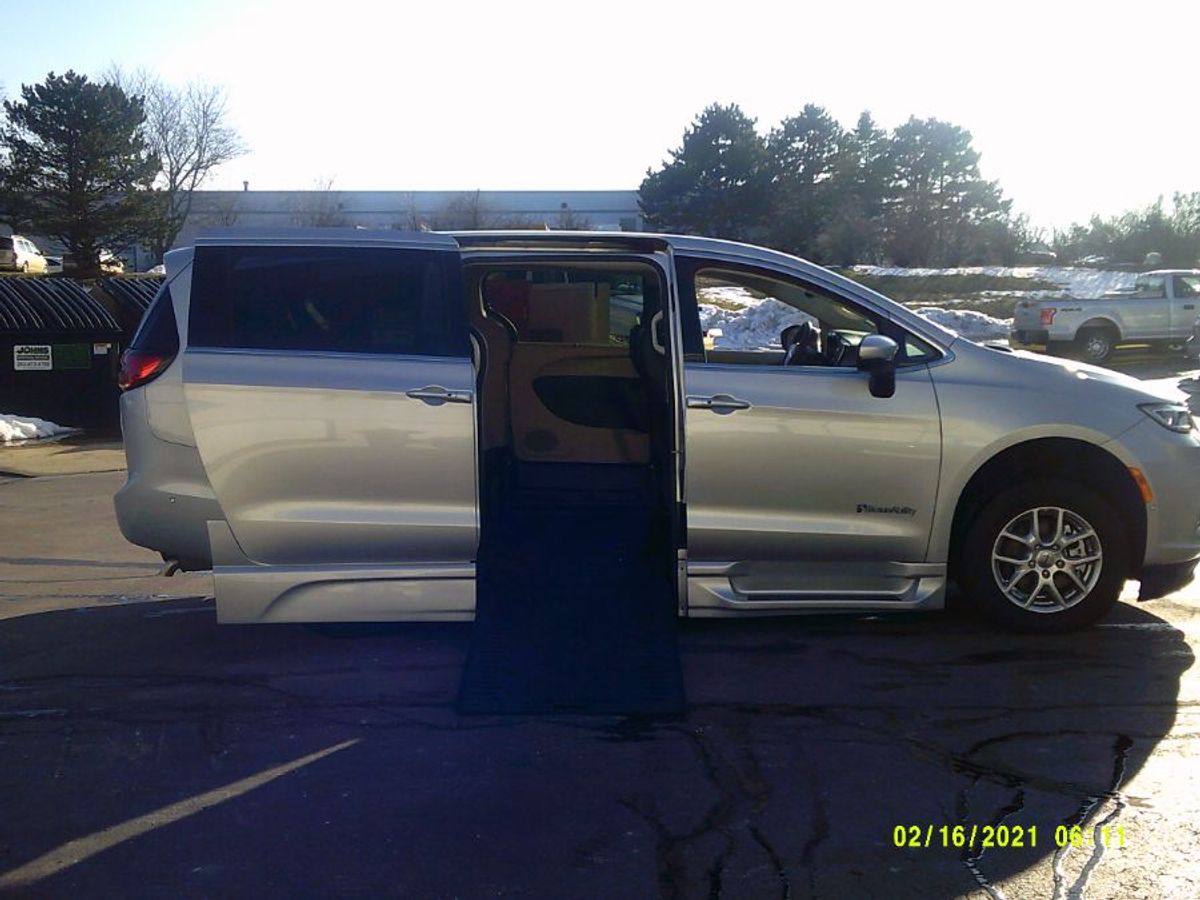 Silver Chrysler Pacifica with BraunAbility Side Entry Automatic In Floor conversion