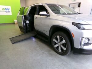 Silver Chevrolet Traverse with BraunAbility Side Entry Automatic In Floor conversion