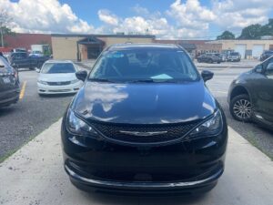 Black Chrysler Voyager with BraunAbility Side Entry Automatic Fold Out conversion