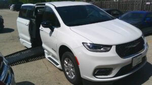 White Chrysler Pacifica with BraunAbility Side Entry Automatic Fold Out conversion