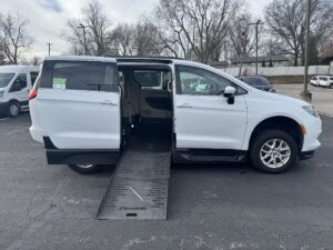 White Chrysler Voyager with BraunAbility Side Entry Manual Fold Out conversion